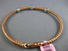 ESTATE .27CT DIAMOND 14KT WHITE & ROSE GOLD X LOVE WAVE FLEXIBLE BANGLE BRACELET