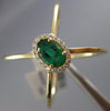 LARGE .53CT DIAMOND & AAA COLOMBIAN EMERALD 14K WHITE GOLD HALO CRISS CROSS RING