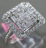 ESTATE LARGE .82CT ROUND & BAGUETTE DIAMOND 18KT WHITE GOLD HALO ENGAGEMENT RING