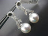 ESTATE .23CT DIAMOND & AAA SOUTH SEA PEARL 18KT WHITE GOLD BOW HANGING EARRINGS