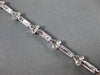 ESTATE .33CT DIAMOND 18KT WHITE GOLD 3D ETOILE TRIANGULAR LOVE TENNIS BRACELET