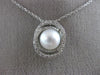 ESTATE .18CT DIAMOND & AAA SOUTH SEA PEARL 14KT WHITE GOLD 3D LOVE KNOT PENDANT