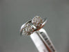 ESTATE .25CT DIAMOND 14KT WHITE GOLD DOUBLE FLOWER CLUSTER CRISS CROSS LOVE RING