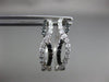 ESTATE .50CT WHITE & BLACK DIAMOND 14KT WHITE GOLD 3D INFINITY HANGING EARRINGS