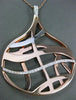 ESTATE LARGE .40CT DIAMOND 14KT WHITE & ROSE GOLD 3D CHOCOLATE KISS PENDANT