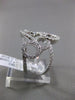 ESTATE .91CT DIAMOND 18KT WHITE GOLD 3D CIRCULAR INFINITY LOVE CRISS CROSS RING