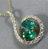 ESTATE LARGE 1.57CT DIAMOND & AAA EMERALD 14KT YELLOW GOLD LOVE FLOATING PENDANT
