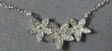 ESTATE .13CT DIAMOND 14K WHITE GOLD CLASSIC PAVE THREE STAR FLOWER LOVE NECKLACE