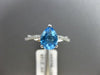 ESTATE 2.07CT DIAMOND & AAA BLUE TOPAZ 18KT WHITE GOLD INFINITY PEAR SHAPE RING