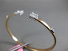 ESTATE .58CT ROUND & BAGUETTE DIAMOND 18KT WHITE & ROSE GOLD 3D BANGLE BRACELET