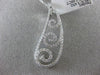 ESTATE LARGE .66CT DIAMOND 18KT WHITE GOLD GRADUATING FLEUR DE LIS WAVE PENDANT