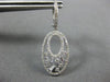 ESTATE .75CT ROUND AND BAGUETTE DIAMOND 14KT WHITE GOLD 3D OVAL HANGING EARRINGS