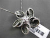 ESTATE LARGE 1.0CT DIAMOND 18KT WHITE & BLACK GOLD FLOWER STAR FLOATING PENDANT