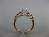 ESTATE .20CT DIAMOND 14KT WHITE & ROSE GOLD OPEN FILIGREE FLOWER ENGAGEMENT RING