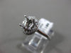 ESTATE .16CT DIAMOND 14KT WHITE GOLD OVAL FOUR PRONG SEMI MOUNT ENGAGEMENT RING