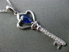 ESTATE .45CT DIAMOND & SAPPHIRE 14KT WHITE GOLD KEY TO MY HEART FLOATING PENDANT