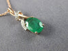 ESTATE .86CT DIAMOND & AAA EMERALD 14KT ROSE GOLD 3D CLASSIC LOVE KNOT PENDANT