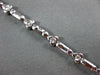 ESTATE .33CT DIAMOND 18KT WHITE GOLD 3D ETOILE TRIANGULAR LOVE TENNIS BRACELET