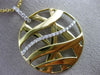 ESTATE LARGE .25CT DIAMOND 18KT WHITE & YELLOW GOLD CIRCULAR CRISS CROSS PENDANT