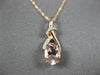 ESTATE .76CT DIAMOND & AAA MORGANITE 14K ROSE GOLD 3D LOVE KNOT FLOATING PENDANT