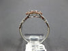ESTATE .54CT WHITE & PINK DIAMOND 14KT WHITE GOLD 3D CLUSTER INFINITY LOVE RING