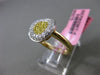 ESTATE WIDE .58CT WHITE & YELLOW DIAMOND 18KT TWO TONE GOLD CIRCULAR HEART RING