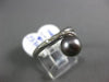 ESTATE .05CT ROUND DIAMOND & AAA TAHITIAN PEARL 18KT WHITE GOLD SWIRL LOVE RING