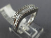 ESTATE .32CT ROUND & BAGUETTE DIAMOND 14K WHITE GOLD SWIRL WAVE ANNIVERSARY RING