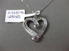 ESTATE .29CT ROUND & BAGUETTE DIAMOND 14K WHITE GOLD FLOATING LOVE HEART PENDANT