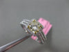 ESTATE 1.36CT WHITE & FANCY YELLOW DIAMOND 18KT 2 TONE GOLD HALO ENGAGEMENT RING