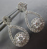 ESTATE .80CT DIAMOND 14KT WHITE GOLD SOLITAIRE INFINITY FLOWER HANGING EARRINGS
