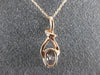 ESTATE .76CT DIAMOND & AAA MORGANITE 14K ROSE GOLD 3D LOVE KNOT FLOATING PENDANT