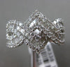 ESTATE 1.92CT BAGUETTE ROUND DIAMOND 18KT WHITE GOLD INFINITY LOVE KNOT FUN RING