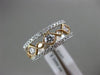 ESTATE WIDE .87CT DIAMOND 18KT WHITE & ROSE GOLD 3/4TH ETERNITY ANNIVERSARY RING