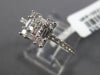 ESTATE .57CT ROUND & BAGUETTE DIAMOND 18KT WHITE GOLD CLUSTER SEMI ETERNITY RING