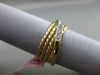 ESTATE .36CT DIAMOND 14KT WHITE & YELLOW GOLD 3D MULTI ROW CRISS CROSS LOVE RING