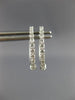ESTATE .25CT DIAMOND 14KT WHITE GOLD 3D CLASSIC OVAL HUGGIE HOOP EARRINGS