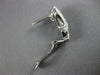 ESTATE .80CT DIAMOND 18KT WHITE GOLD 3D ROUND & BAGUETTE BOW CLIP ON EARRINGS