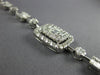 4.20CT DIAMOND 18KT WHITE GOLD CLUSTER INVISIBLE SQUARE & ROUND TENNIS BRACELET