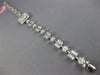 4.20CT DIAMOND 18KT WHITE GOLD CLUSTER INVISIBLE SQUARE & ROUND TENNIS BRACELET