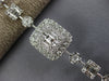 4.20CT DIAMOND 18KT WHITE GOLD CLUSTER INVISIBLE SQUARE & ROUND TENNIS BRACELET