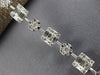 4.20CT DIAMOND 18KT WHITE GOLD CLUSTER INVISIBLE SQUARE & ROUND TENNIS BRACELET