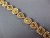 WIDE 9.73CT WHITE & CANARY DIAMOND 18KT YELLOW GOLD MULTI SHAPE TENNIS BRACELET