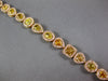 WIDE 9.73CT WHITE & CANARY DIAMOND 18KT YELLOW GOLD MULTI SHAPE TENNIS BRACELET