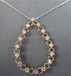 .48CT DIAMOND 14KT WHITE AND ROSE GOLD 3D OPEN TEAR DROP FLOATING LOVE PENDANT