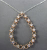 .48CT DIAMOND 14KT WHITE AND ROSE GOLD 3D OPEN TEAR DROP FLOATING LOVE PENDANT