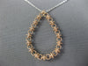 .48CT DIAMOND 14KT WHITE AND ROSE GOLD 3D OPEN TEAR DROP FLOATING LOVE PENDANT