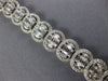 ESTATE LARGE 5.99CT DIAMOND 18KT WHITE GOLD 3D INVISIBLE OVAL TENNIS BRACELET