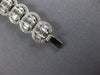 ESTATE LARGE 5.99CT DIAMOND 18KT WHITE GOLD 3D INVISIBLE OVAL TENNIS BRACELET
