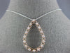 .48CT DIAMOND 14KT WHITE AND ROSE GOLD 3D OPEN TEAR DROP FLOATING LOVE PENDANT